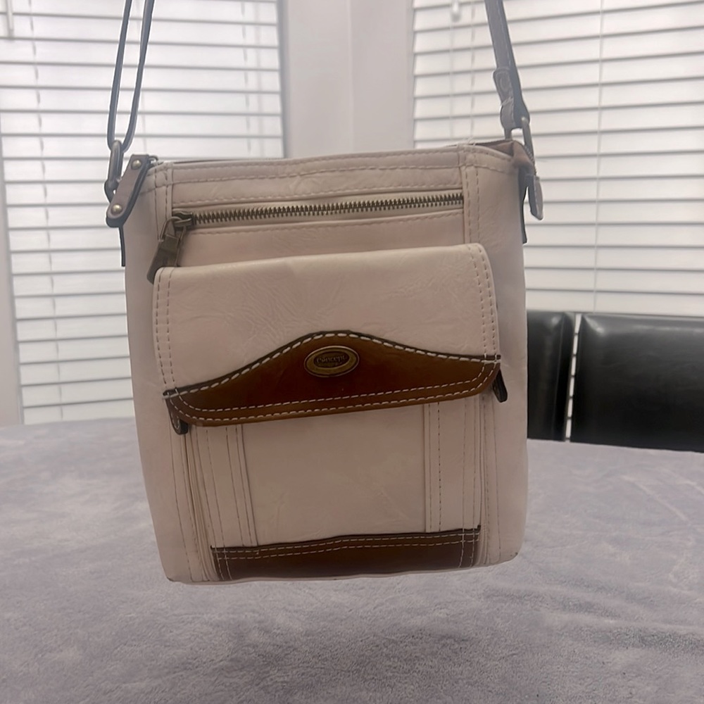 Concept, Shoulder bag in beige and tan color.